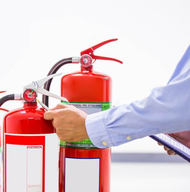 Fire extinguishers being checked